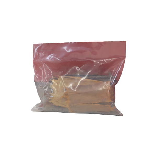 Clear plastic bag with red top containing yellow rubber bands on a white background