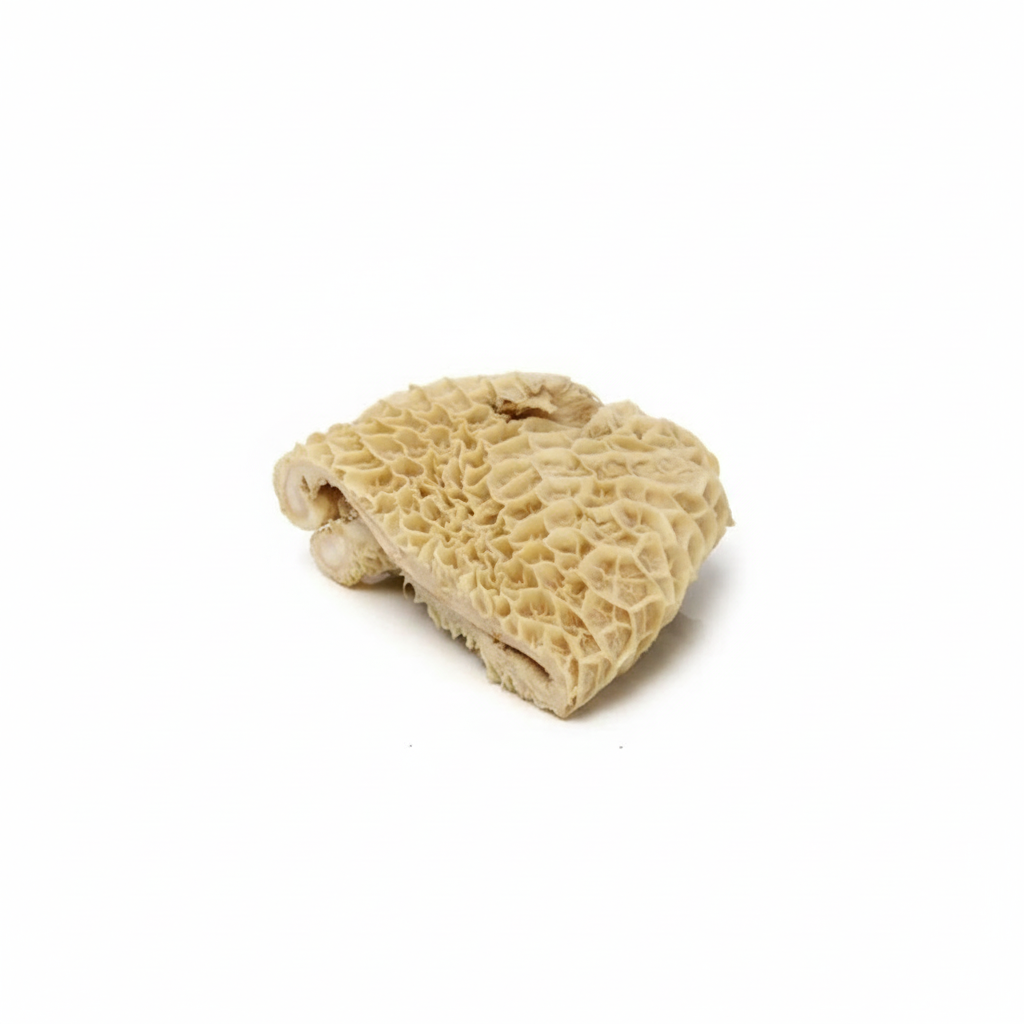 A piece of frozen cow tripe, with a rough, textured appearance, against a white background. The image includes a logo and text indicating the product is from Africa Online.