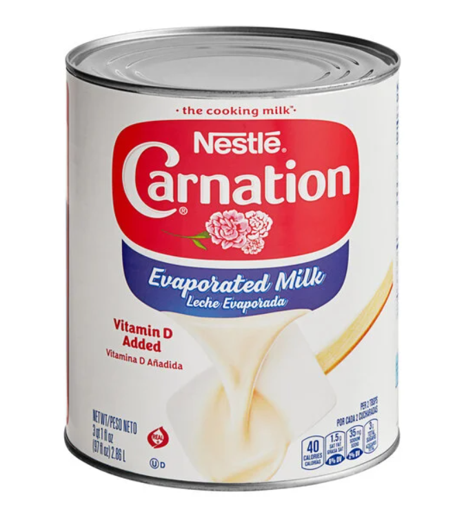 Can of Nestle Carnation Evaporated Milk on a white background