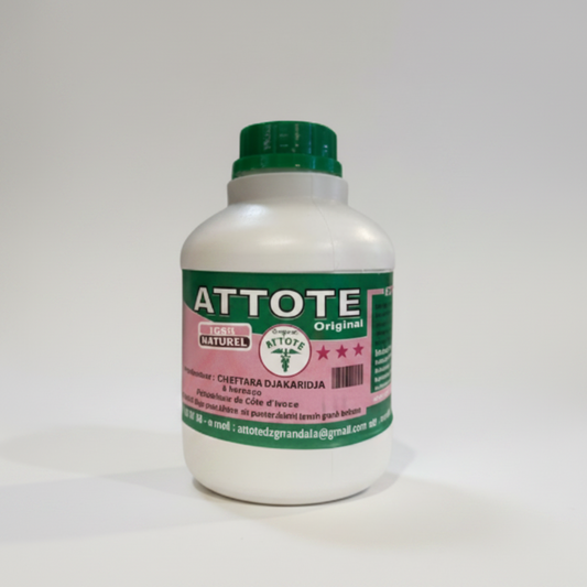A plastic bottle labeled 'ATTOTEE HERBS' with a green cap on a white background.