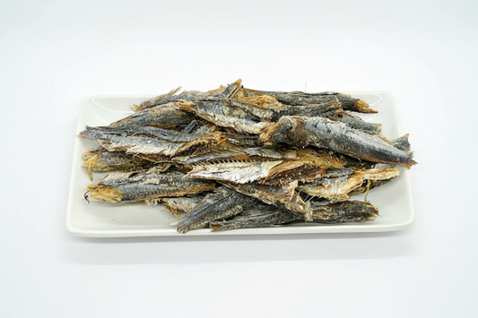 Dried fish on a white plate
