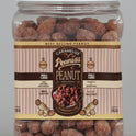 Jar of caramelized peanuts with a visible label on a red background