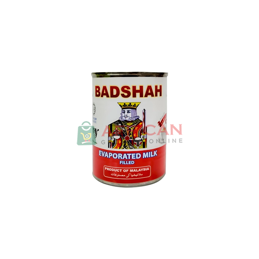 A can of Badshah brand evaporated milk, with a decorative label featuring a king.