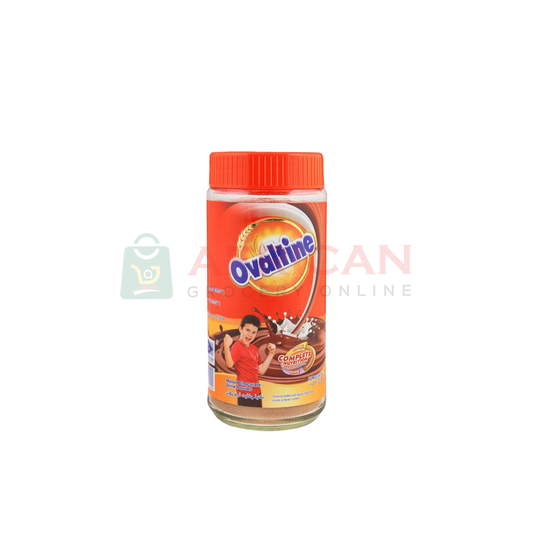 A bottle of Ovaltine, with a red cap and an label featuring the brand name and a cartoon image of a person exercising.